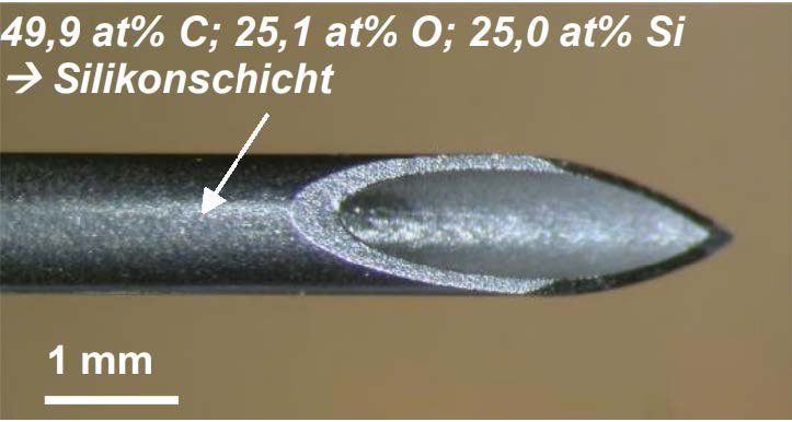 Abb. 4: Spitze einer Hohlkanüle und die mit ESCA gefundenen Elementkonzentrationen in den obersten Nanometern der Kanülen-Außenseite, welche auf eine Silikonschicht hinweisen
